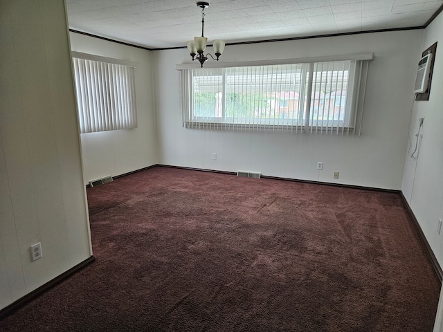 unfurnished room featuring dark carpet and a notable chandelier