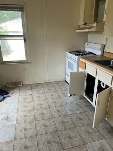 kitchen featuring white gas range oven