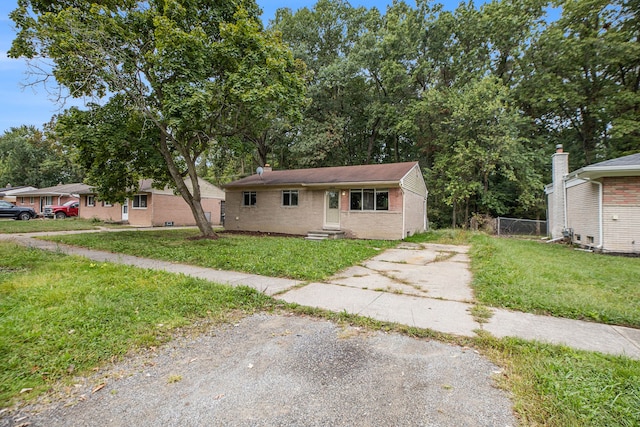 view of front of home with a front lawn