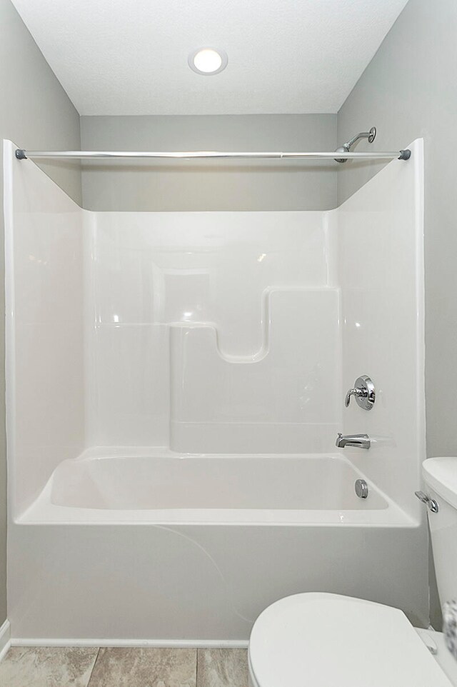 full bath with  shower combination and toilet