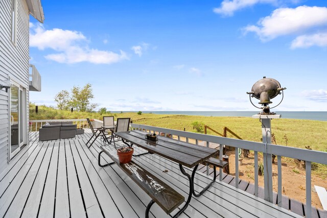 300 Marquette Dr, New Buffalo, MI 49117 - wooden deck with an outdoor living space and a water view