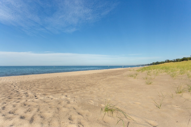 view of water feature with a beach view