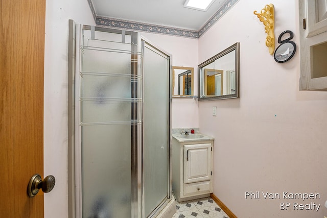 bathroom with vanity and walk in shower