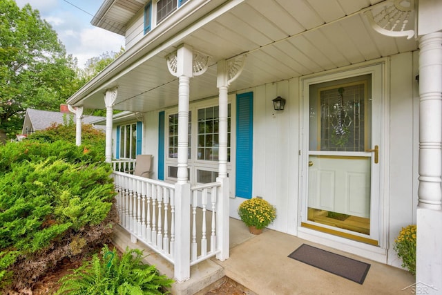 doorway to property featuring a porch