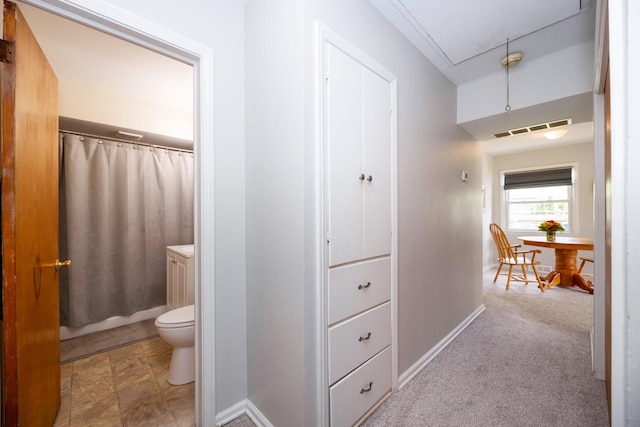 bathroom with toilet and shower / tub combo with curtain