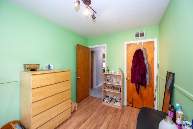 bedroom featuring light hardwood / wood-style floors