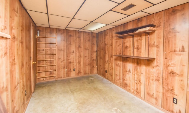 11768 Riker Rd, Litchfield, MI 49252 - finished basement featuring wood walls and a drop ceiling