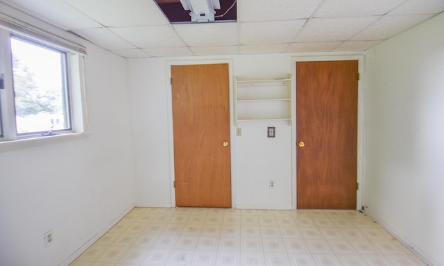 11768 Riker Rd, Litchfield, MI 49252 - spare room featuring a drop ceiling and tile patterned floors