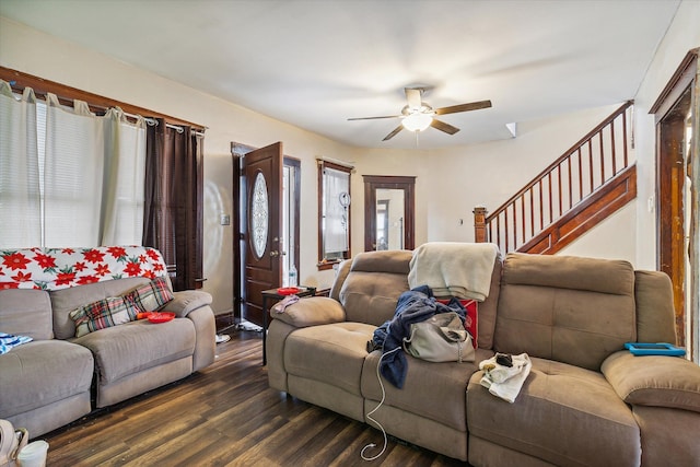 living room with ceiling fan, dark hardwood / wood-style flooring, and a wealth of natural light