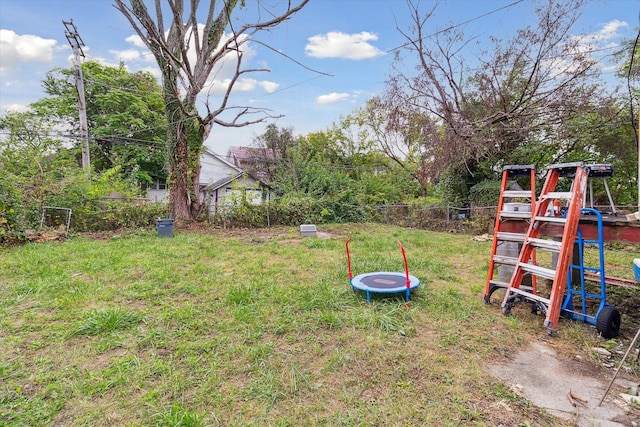 view of yard featuring a trampoline