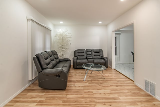 living room featuring light hardwood / wood-style floors