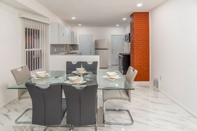 dining area with sink