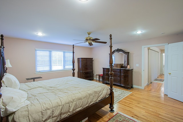 bedroom featuring ceiling fan and light wood-type flooring