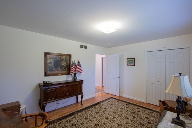 sitting room with light wood-type flooring