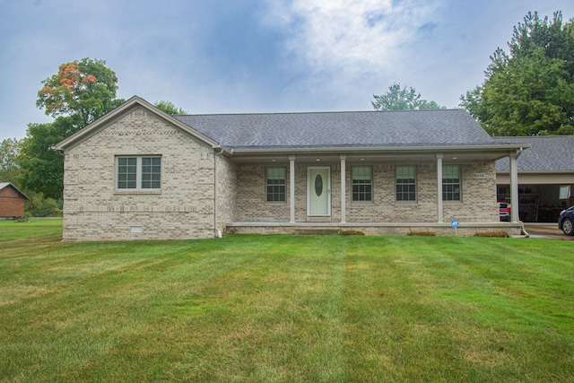 single story home featuring covered porch and a front yard