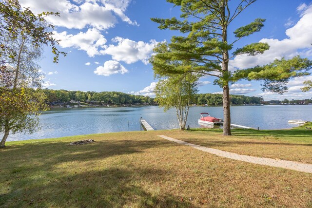 property view of water featuring a boat dock