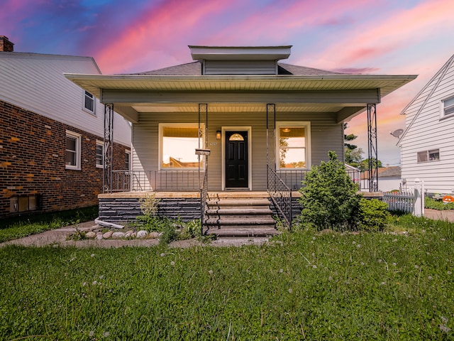 bungalow-style home featuring covered porch