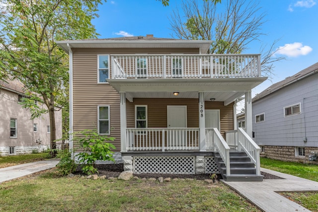 view of front of home featuring a front yard