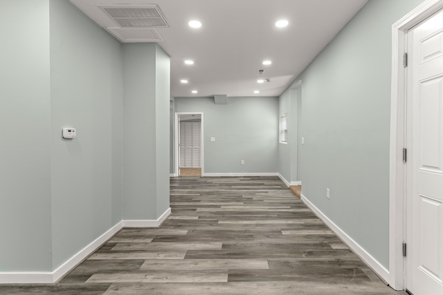 hall featuring dark wood-type flooring