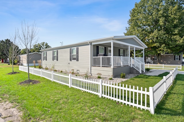 view of front of home featuring a porch and a front yard