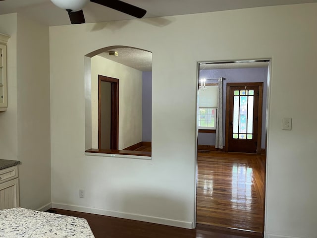 interior space with dark wood-type flooring