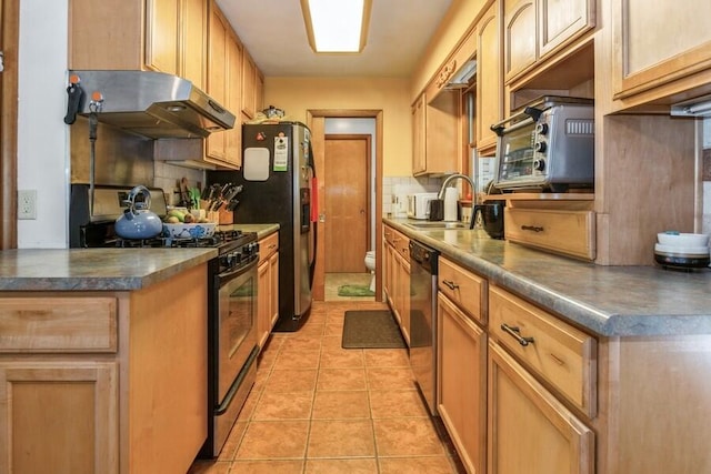 kitchen featuring dishwasher, backsplash, sink, range hood, and gas stove