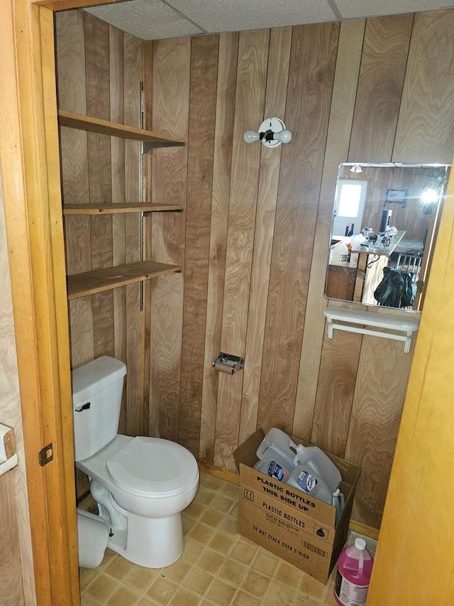 bathroom with a textured ceiling and toilet