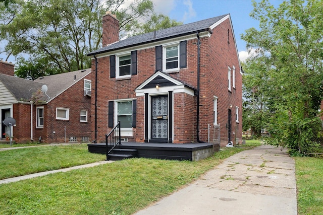 view of front of home with a front yard