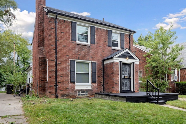 view of front of home with a front lawn