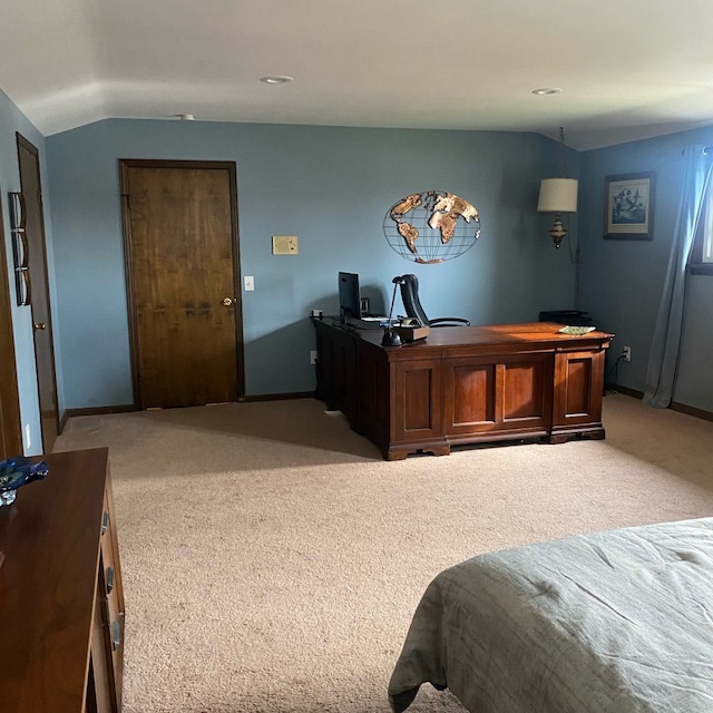 bedroom with light carpet and vaulted ceiling