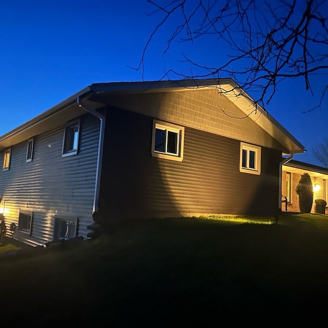 view of side of home with cooling unit