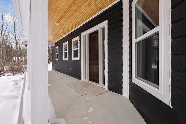 view of snow covered patio