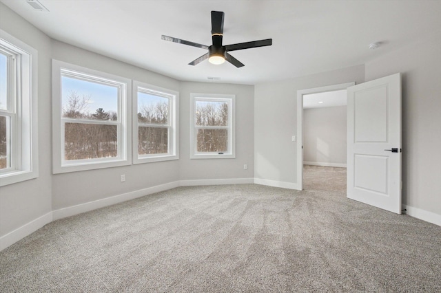 unfurnished bedroom featuring ceiling fan and carpet floors