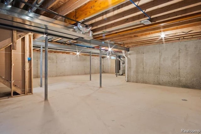 basement featuring water heater