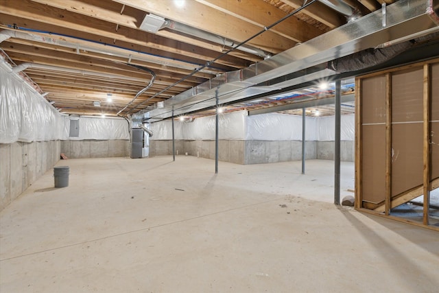 unfinished basement with heating unit