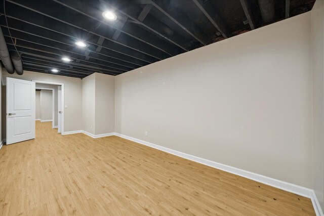 basement featuring light hardwood / wood-style flooring