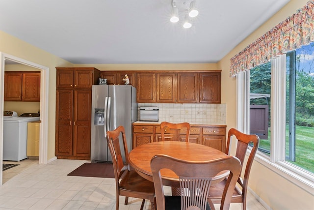 dining area with washing machine and dryer