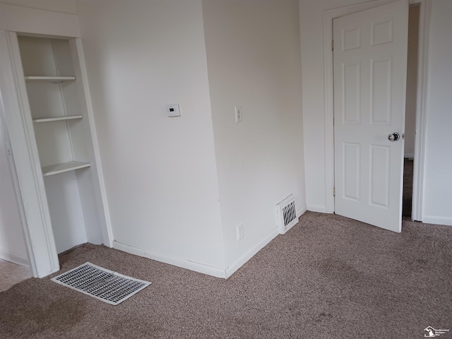 639 Michigan Ave, Monroe, MI 48162 - interior space featuring carpet, visible vents, and baseboards