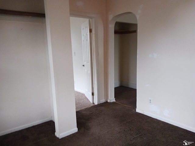 639 Michigan Ave, Monroe, MI 48162 - spare room with carpet, arched walkways, and baseboards