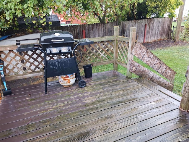 639 Michigan Ave, Monroe, MI 48162 - wooden terrace with fence and grilling area