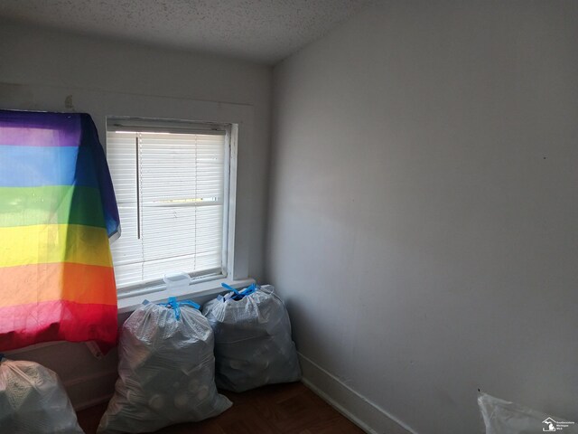 bedroom featuring a textured ceiling