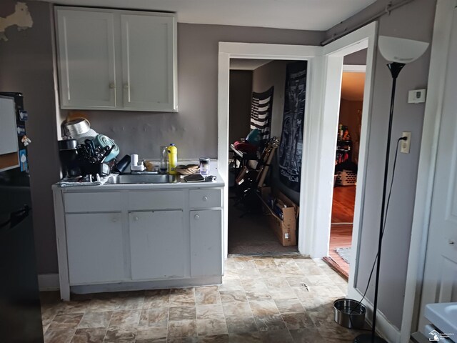 kitchen with white cabinetry