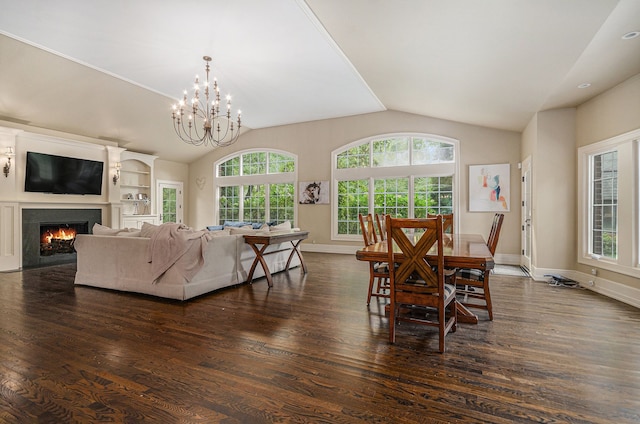 dining area featuring built in features, dark hardwood / wood-style flooring, lofted ceiling, and an inviting chandelier