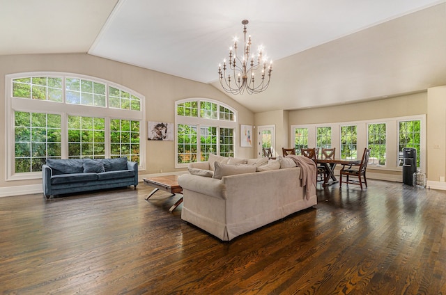 living room featuring a notable chandelier, a healthy amount of sunlight, dark hardwood / wood-style flooring, and high vaulted ceiling