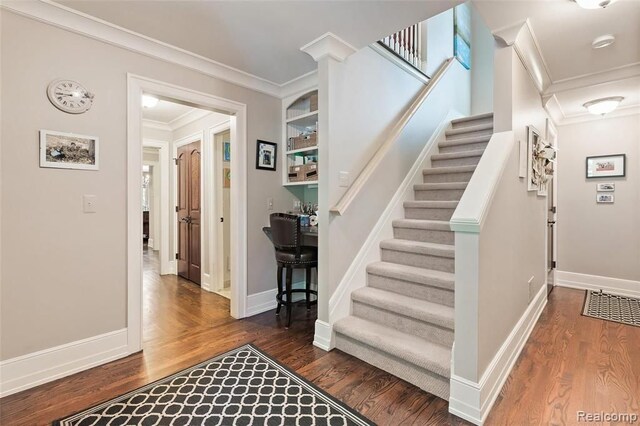 26061 Hawthorne Dr, Franklin, MI 48025 - staircase featuring ornamental molding, wood finished floors, and baseboards