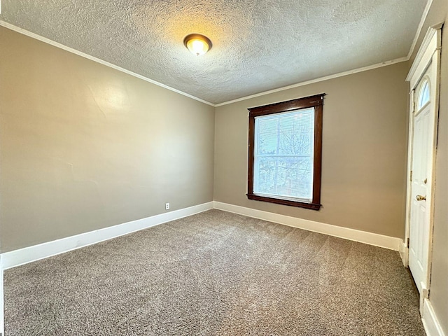 unfurnished room with crown molding, carpet floors, and a textured ceiling