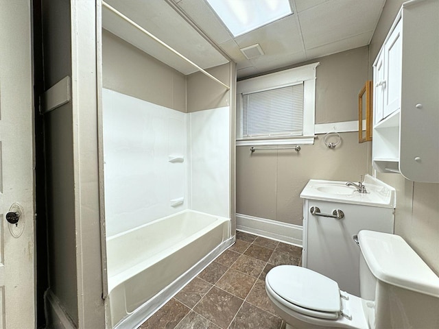 full bathroom featuring tile patterned floors, vanity, toilet, and washtub / shower combination