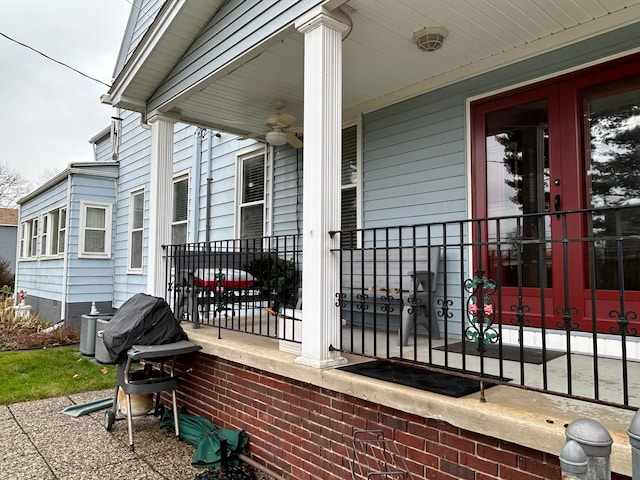 view of patio with central AC and a porch