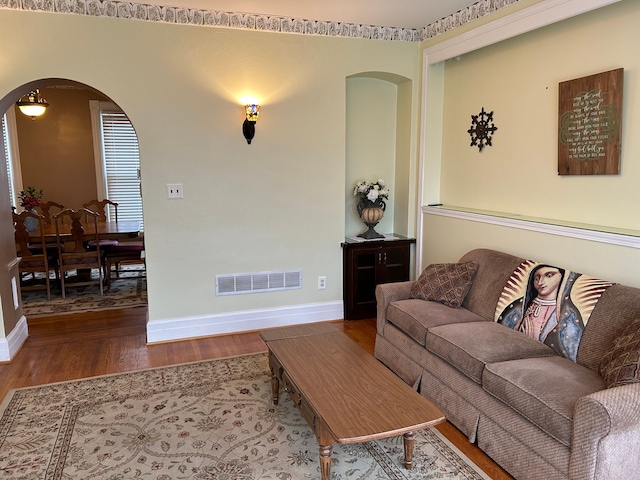 living room with wood-type flooring