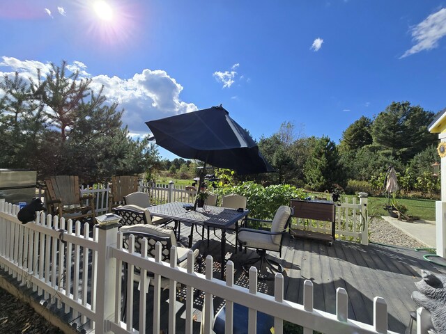 12259 Niemi, Kaleva, MI 49645 - wooden deck featuring outdoor dining space